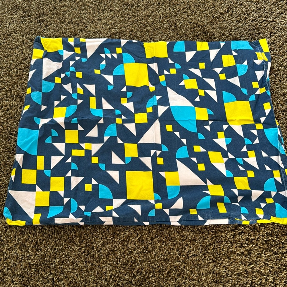 Set of two Unison geometric pillowcases